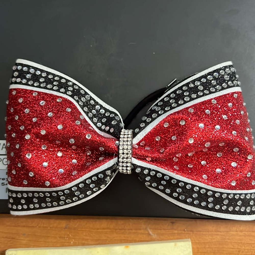 Competition cheer bow with no tail. Stiff and sturdy.